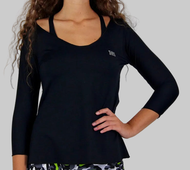 Segunda capa ligera y suelta para jugar a pádel femenino tejido técnico y ecológico color negro zas