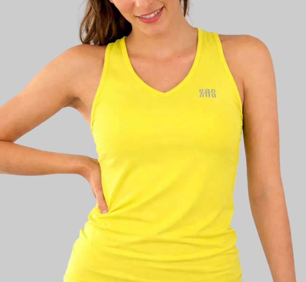 Camiseta Stay amarilla técnica para mujer de pádel