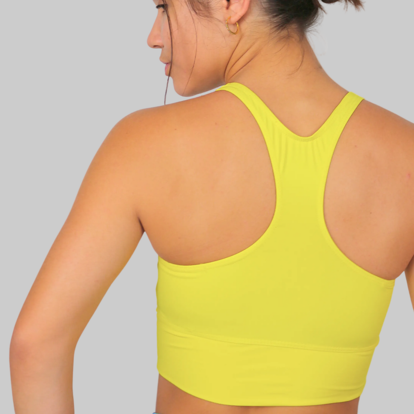 Sujetador de deporte para mujer amarillo con espalda nadadora, tejido ecológico fabricado en España zas