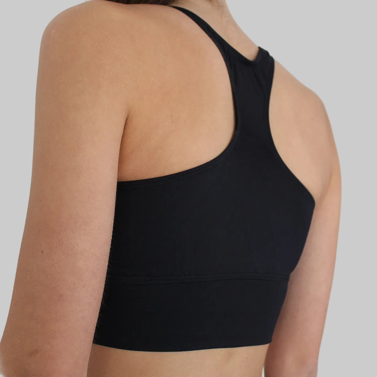 Sujetador deportivo top técnico negro con espalda cruzada zas