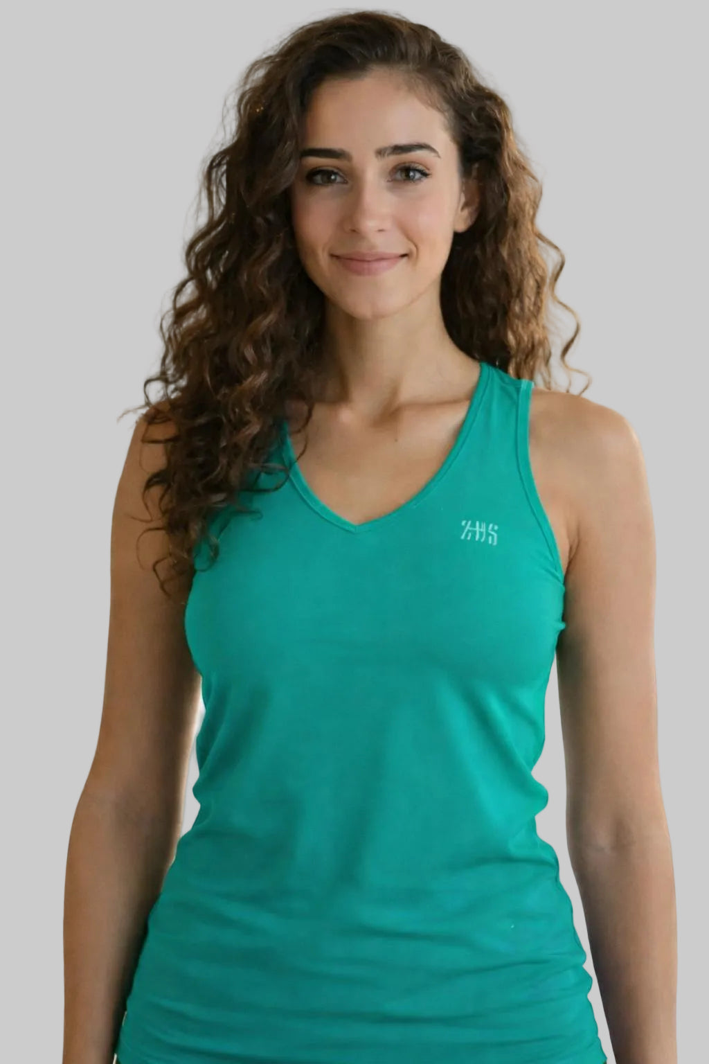 Camiseta de pádel femenina de color verde esmeralda