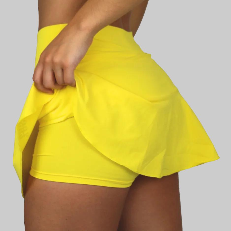 Falda de padel femenina de color amarillo