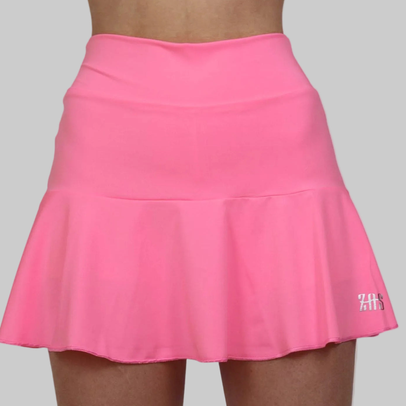 Falda deportiva con volante, para jugar a pádel de color rosa chicle