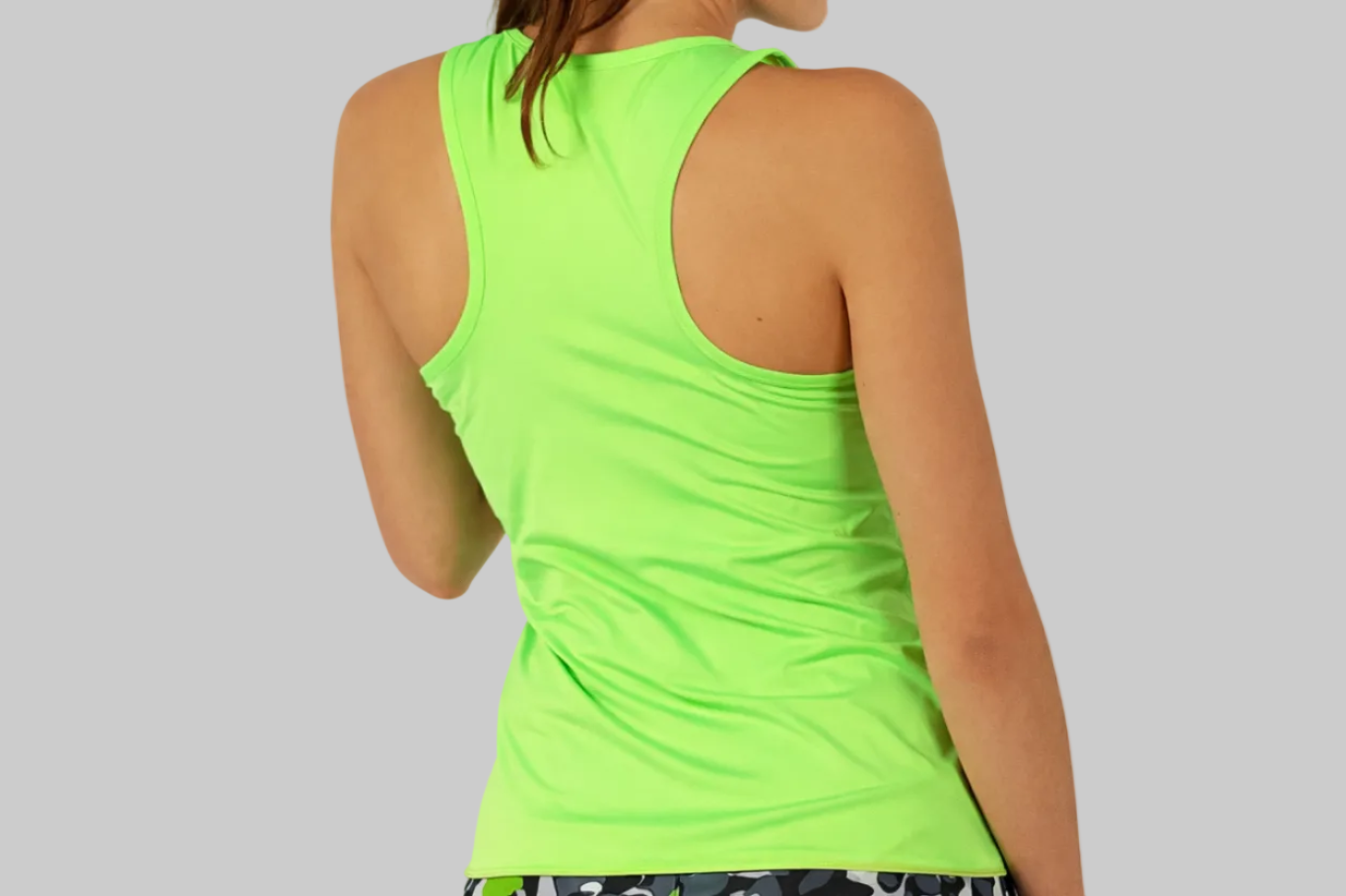Top técnico de pádel mujer color verde fluor ZAS STAY con tejido sostenible SEAQUAL