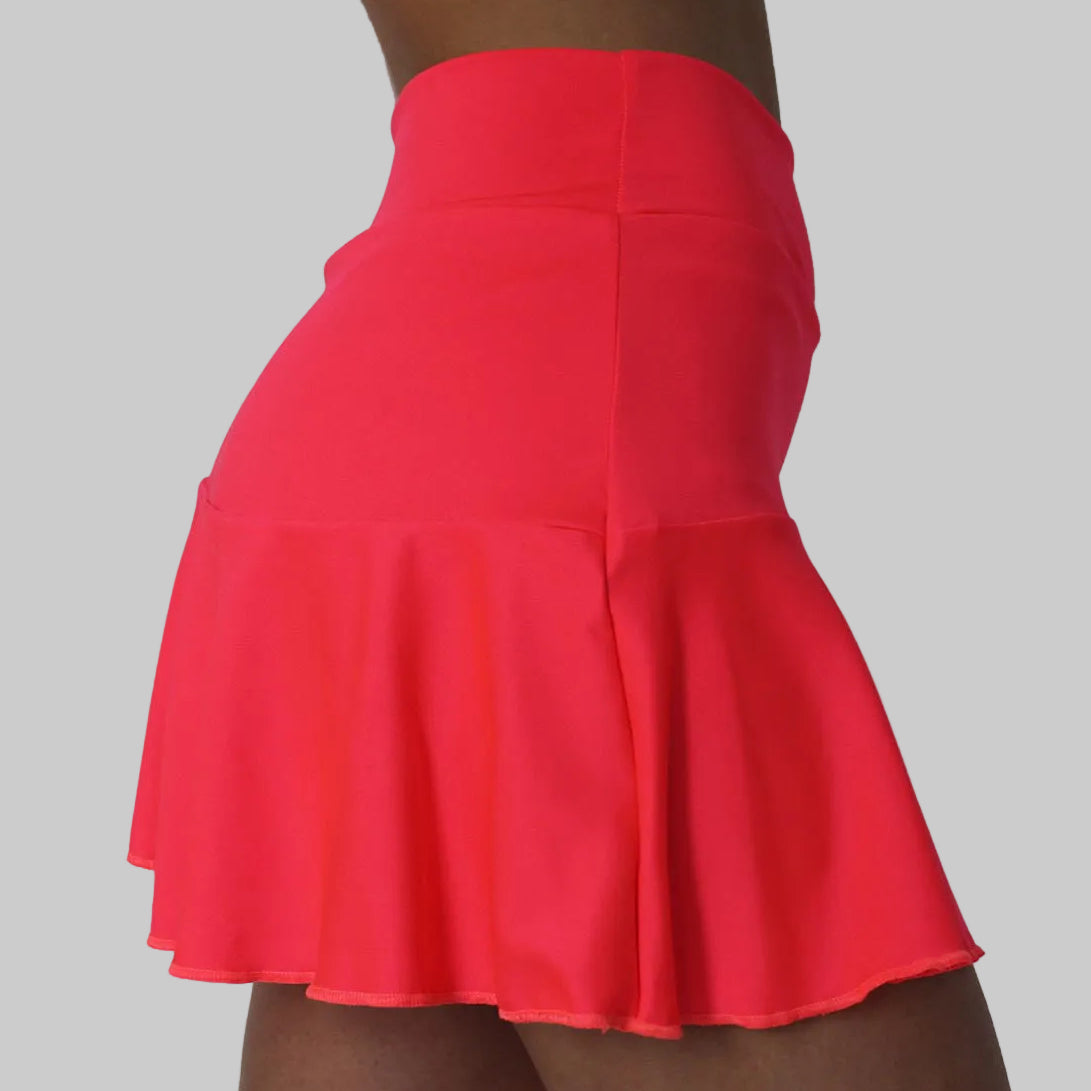 Falda de pádel con vuelo color coral