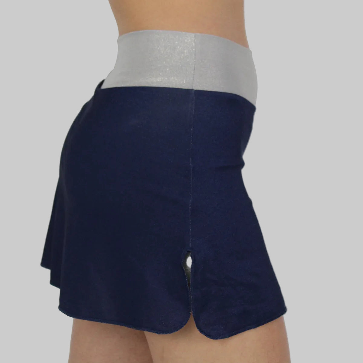 Lateral de la falda navy gold de zas