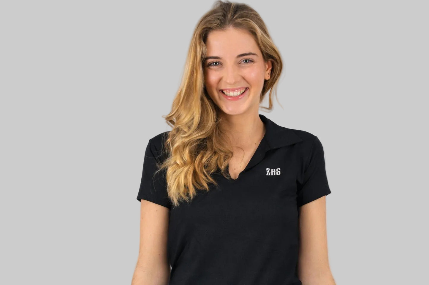 Polo femenino de tejido técnico para jugar a pádel Zas