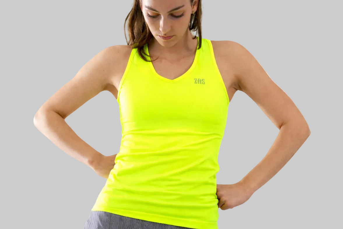 Top técnico de pádel mujer color amarillo fluor ZAS STAY con tejido sostenible SEAQUAL