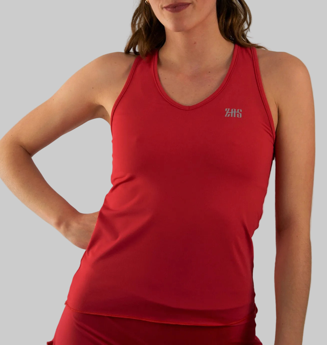 Top técnico de pádel mujer rojo STAY ZAS con tejido sostenible SEAQUAL