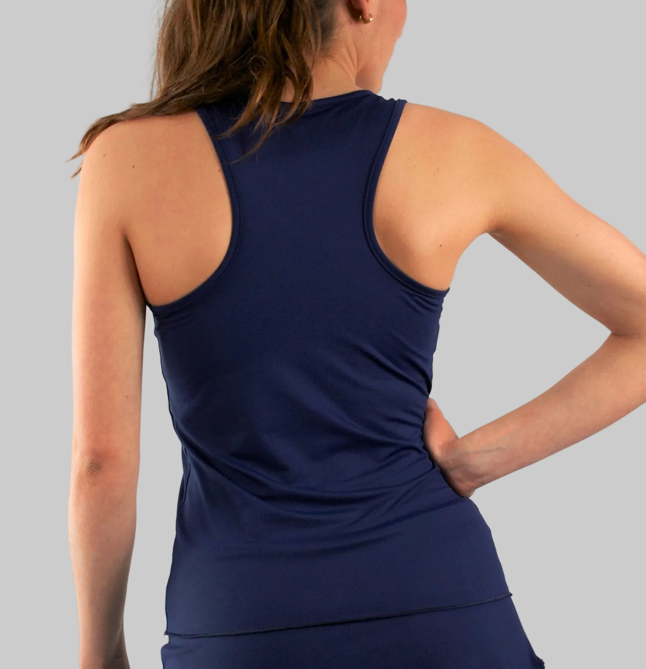 Top técnico de pádel mujer azul marino STAY ZAS con tejido sostenible SEAQUAL